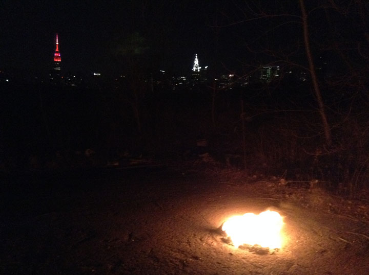 A solemn ceremonial fire on perhaps the last patch of entirely undeveloped East River waterfront land after a dozen years of Bloomberg rule in New York. ©2013 Derek Henry Flood