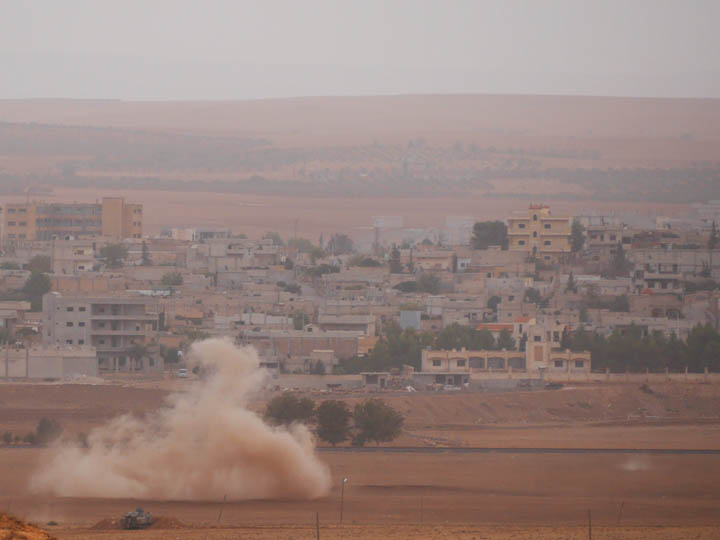 A mortar launched from inside Kobane lands in Mursitpinar, Turkey. ©2014 Derek Henry Flood